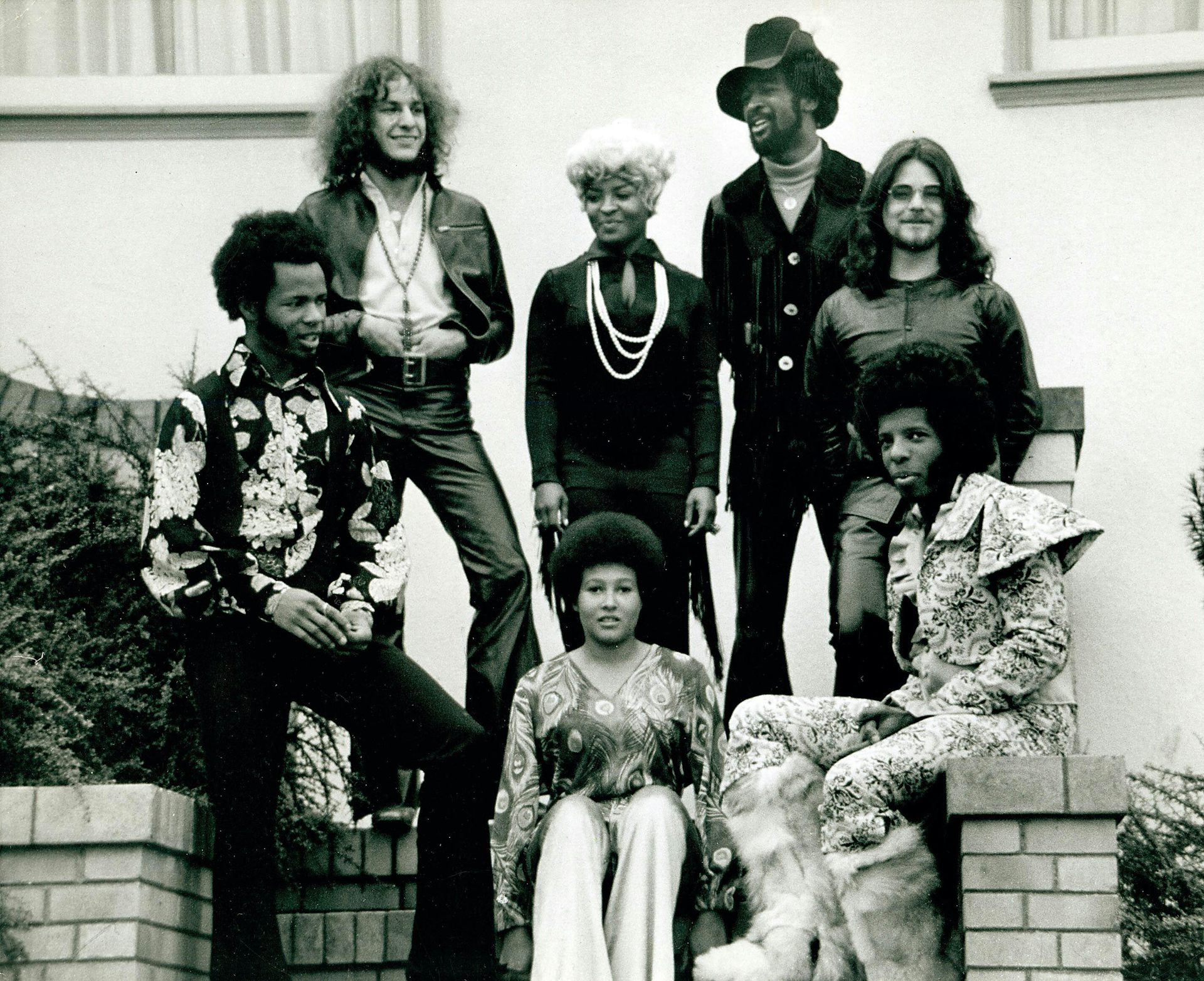 A group of black and white musicians in the late 1960s.