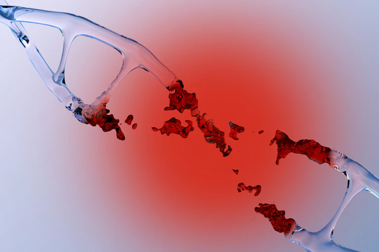 Illustration of DNA disintegrating at the taper of its helix, a red glow surrounding the break