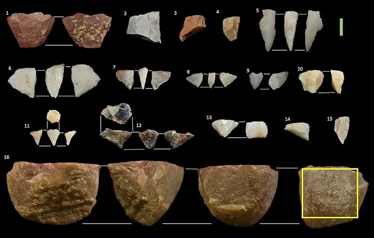 Pieces of stone laid out on a dark background