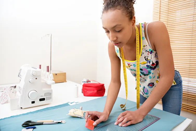 Girl working on sewing project