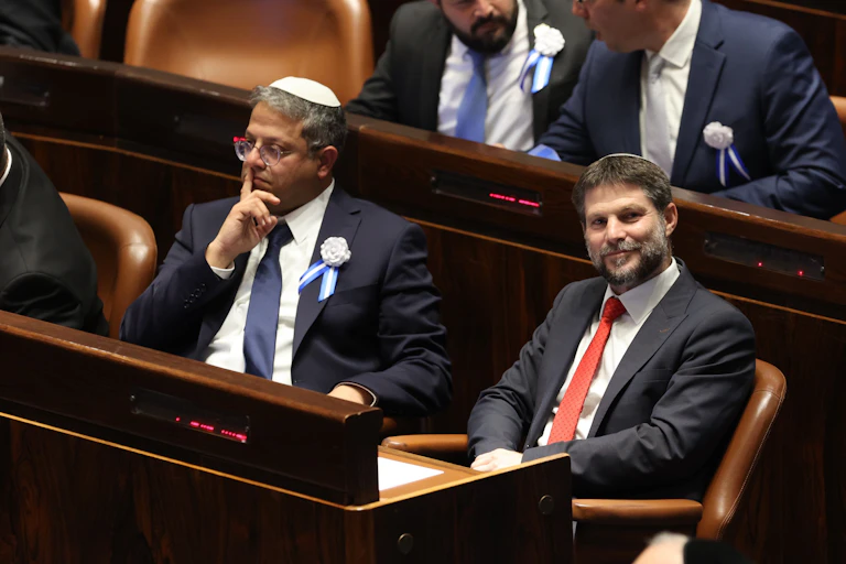 Israeli right wing Knesset member Itamar ben Gvir (L) and Bezalel Smotrich (R)
