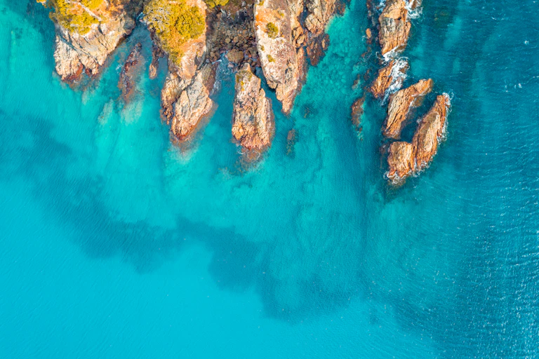 Aerial view of a rocky coastline and the ocean