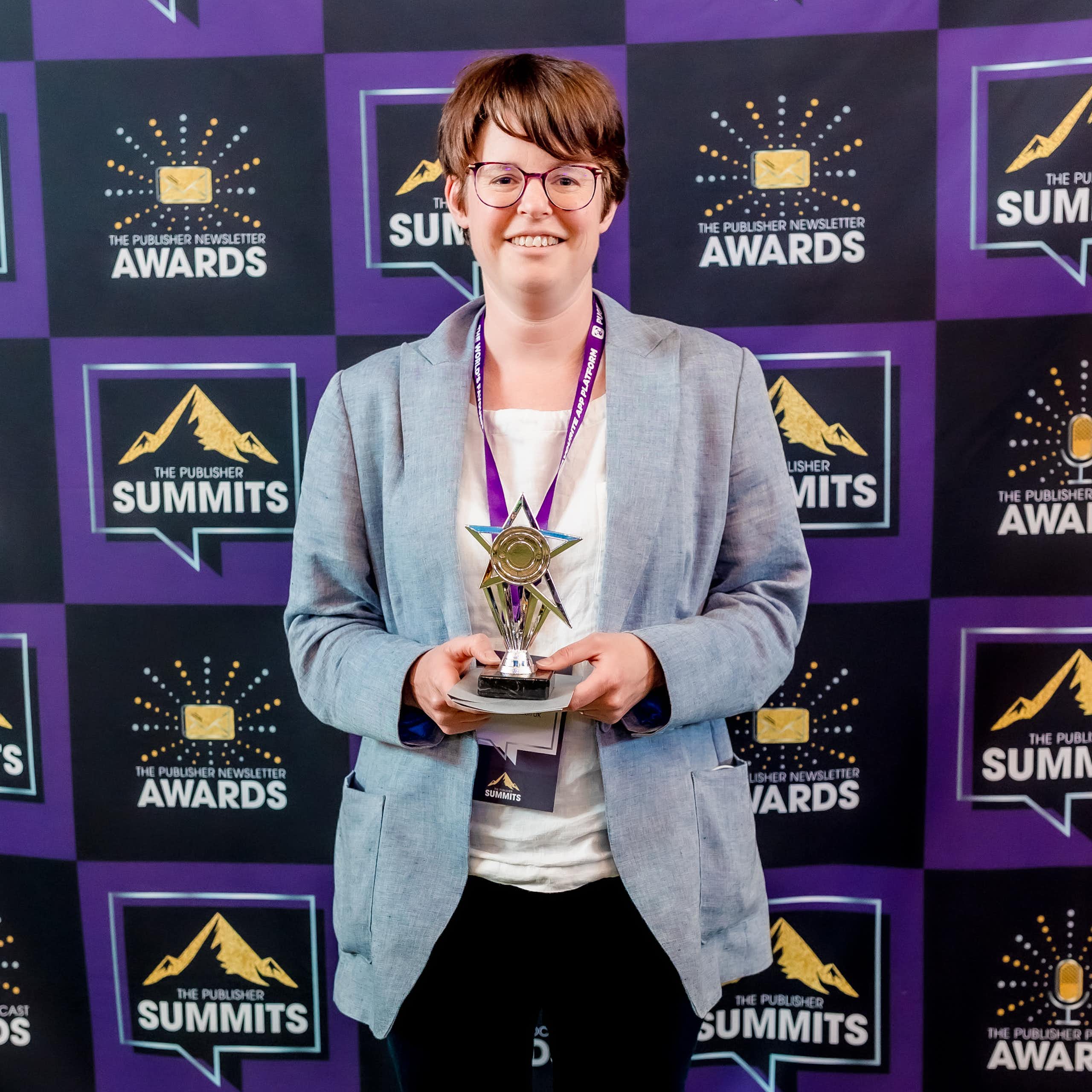 Gemma Ware collecting podcast award