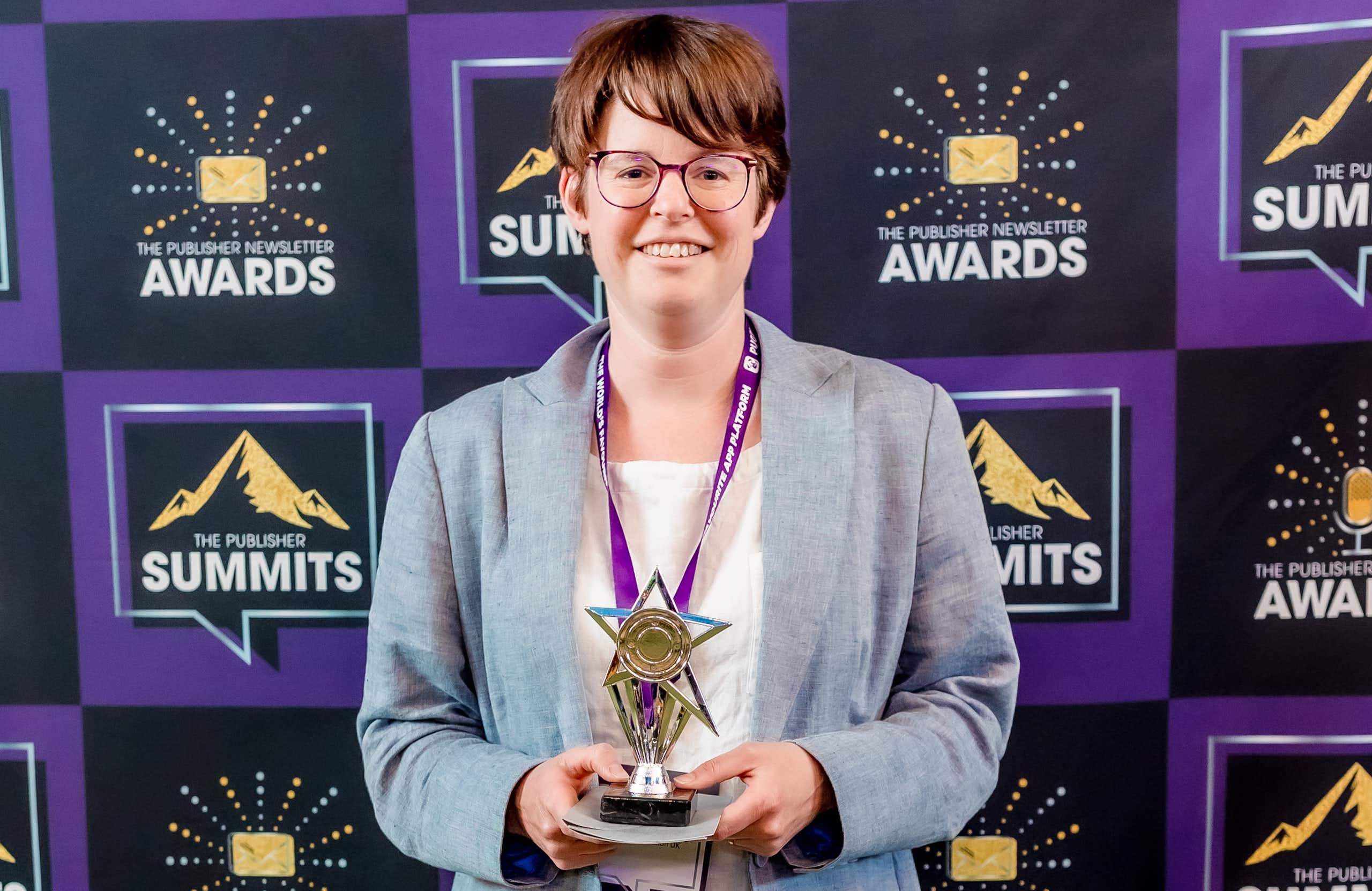 Gemma Ware collecting podcast award