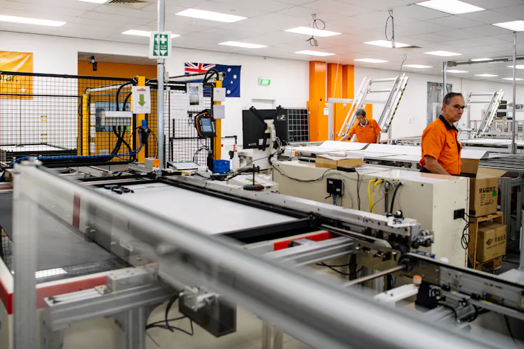 Workers making solar panels at the Tindo Solar facility in Adelaide.