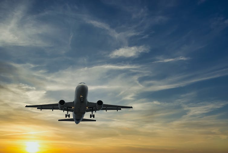 A plane in the sky.