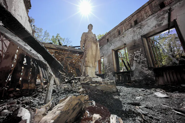 A statue of Ukrainian philosopher Hryhorii Skovoroda in the ruins of his memorial museum.