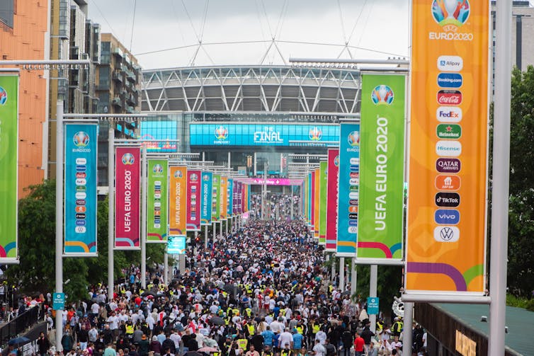 Crowds heading for Wembley stadium.