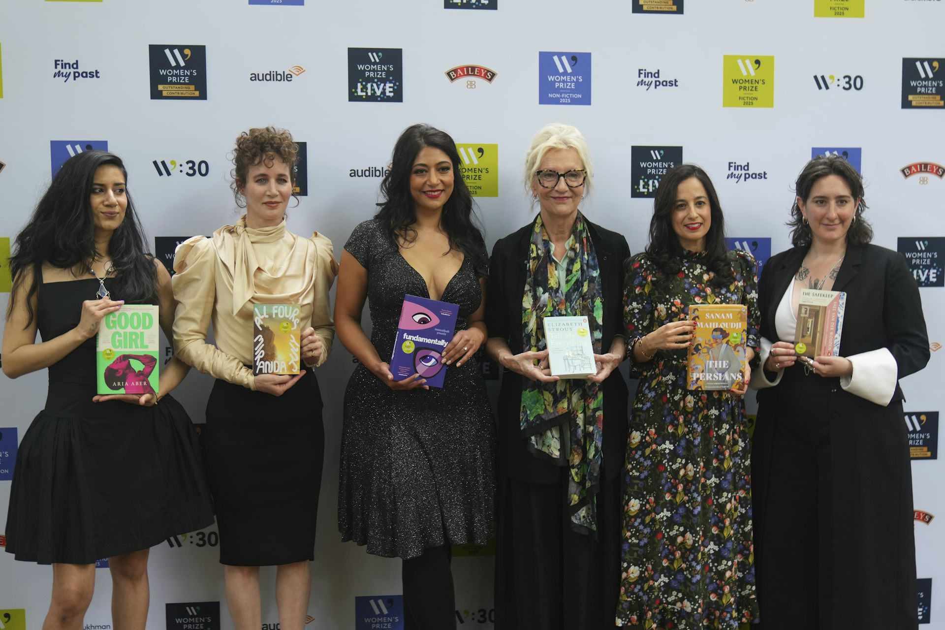 Women in a line holding books