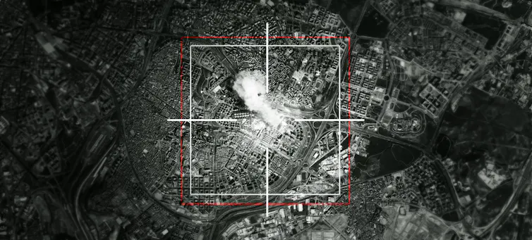 A satellite image of an unknown urban landscape, with a target around where an explosion is taking place
