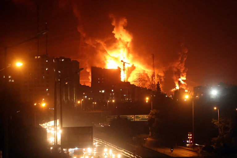 Large industrial fire lights up the night sky