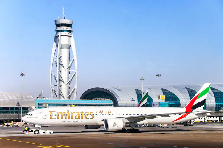 An Emirates plane taxiing in the Dubai International Airport.