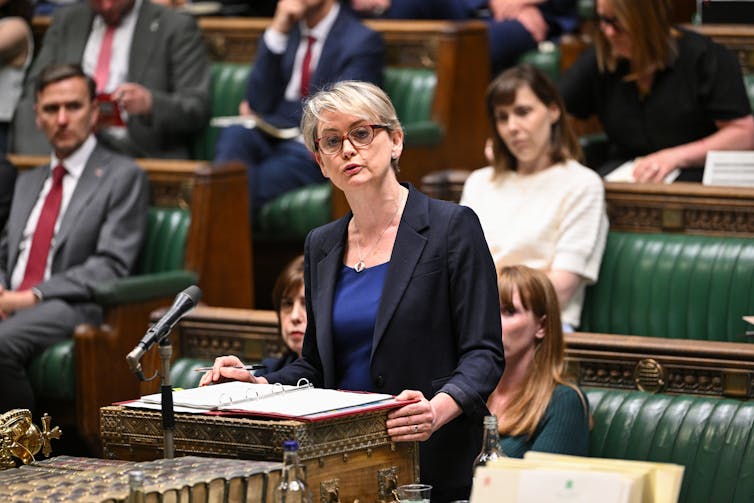 Cooper speaking in the house of commons