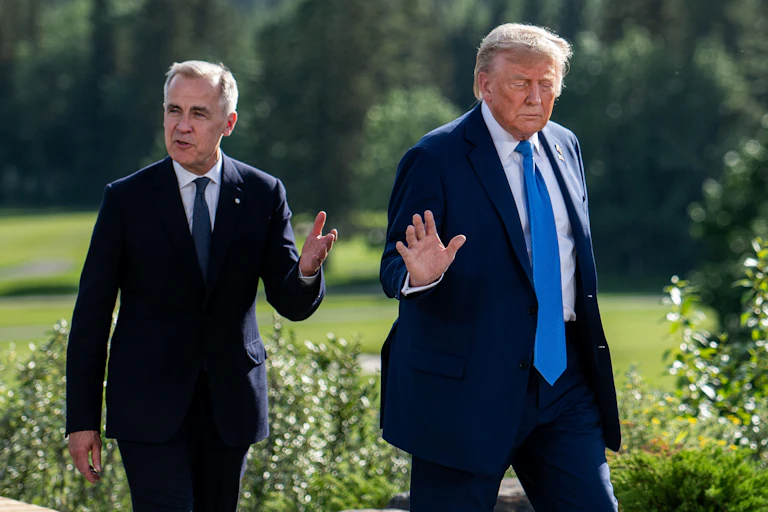 Mark Carney walking outside with Donald Trump.