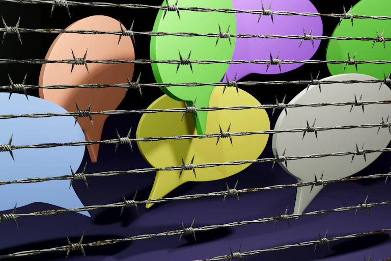 A number of word bubbles with barbed wire covering them.