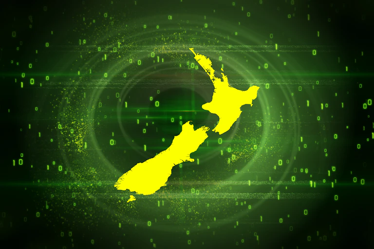 Stylised outline map of NZ, coloured yellow, against a background representing binary computer code