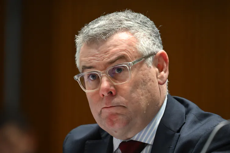 man looking at camera.