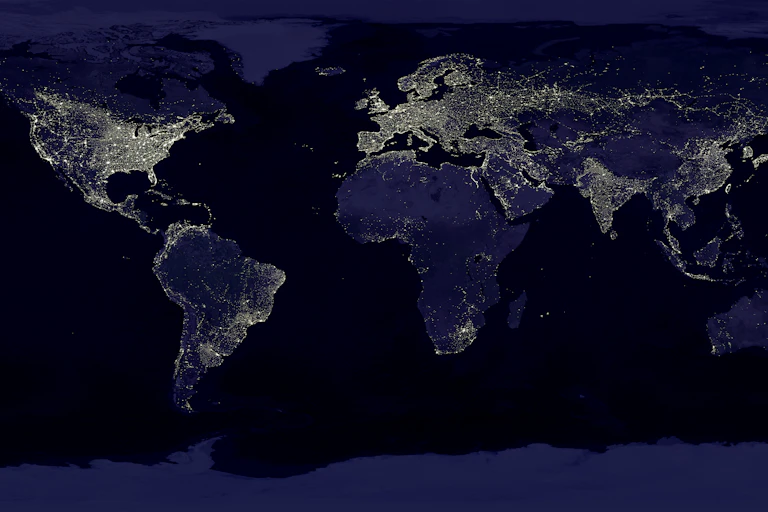 A series of satellite images of Earth, with developed areas lighted, are compiled into a single image.