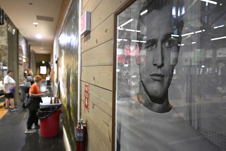 A portrait of the late actor Paul Newman is seen in a corridor.