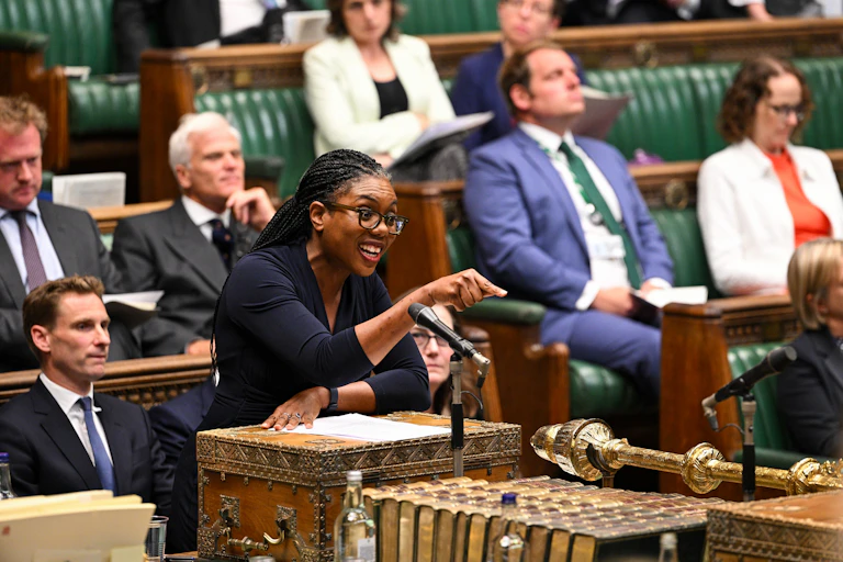 Kemi Badenoch speaking and pointing in the House of Commons