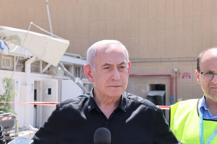 How may Israel assault Iran’s underground nuclear plant? A 2024 raid in Syria generally is a template 1 Israeli prime minister Benjamin Netanyahu dressed in a black open-necked shirt.