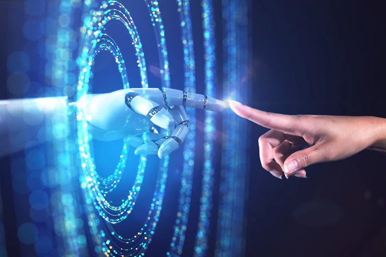 Abstract image of a woman's hand accessing the digital world from the real world.
