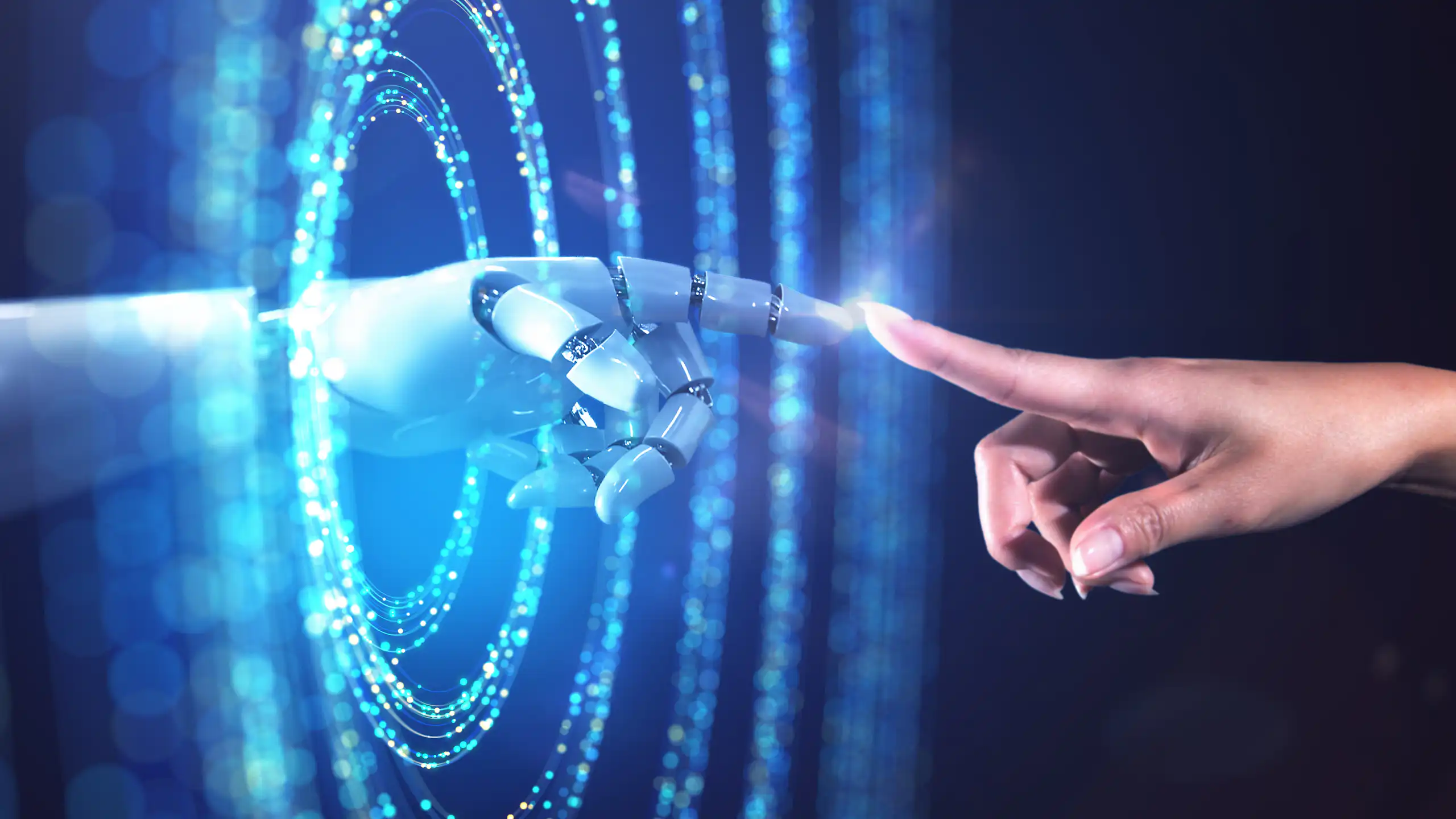 Abstract image of a woman's hand accessing the digital world from the real world.