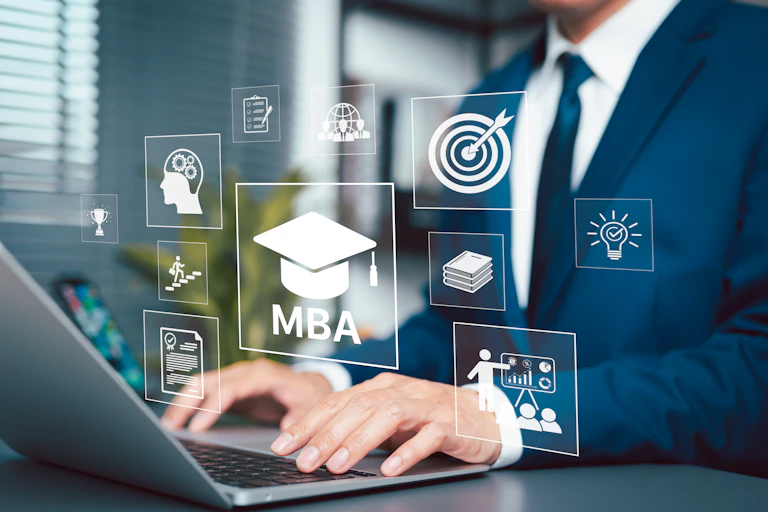 Businessman using laptop with icons of MBA degree education, graduation cap, target, career growth, book, learning, goal setting, development.