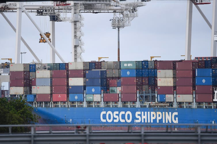 Containers waiting to be loaded onto a ship.