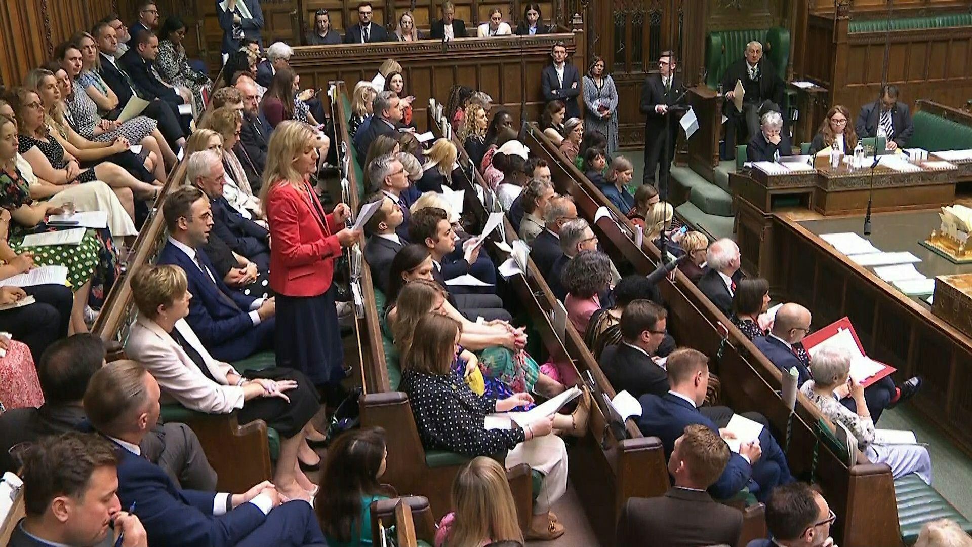 Kim Leadbeater standing up in a packed House of Commons.