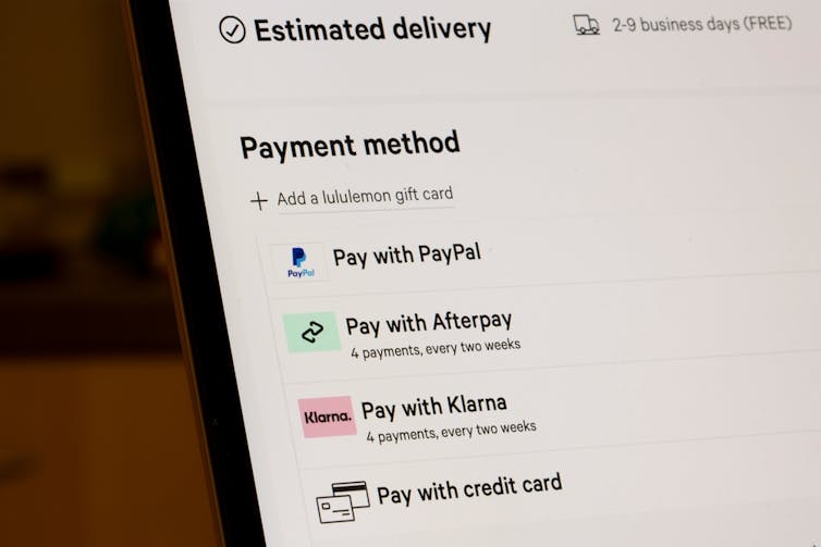 mobile phone screen showing a checkout page on a retail website with buy now pay later options