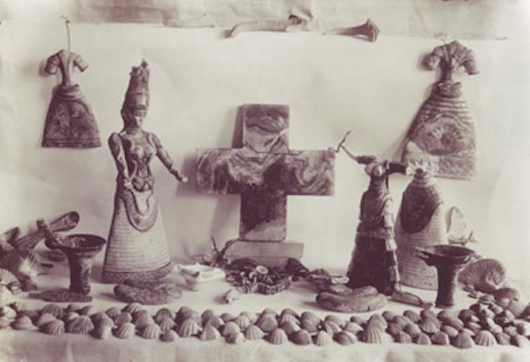 Sepia photo of figurines.