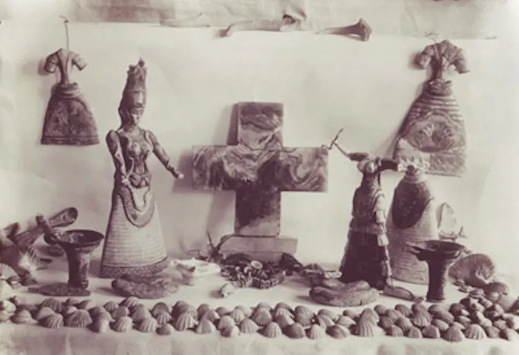 Sepia photo of figurines.