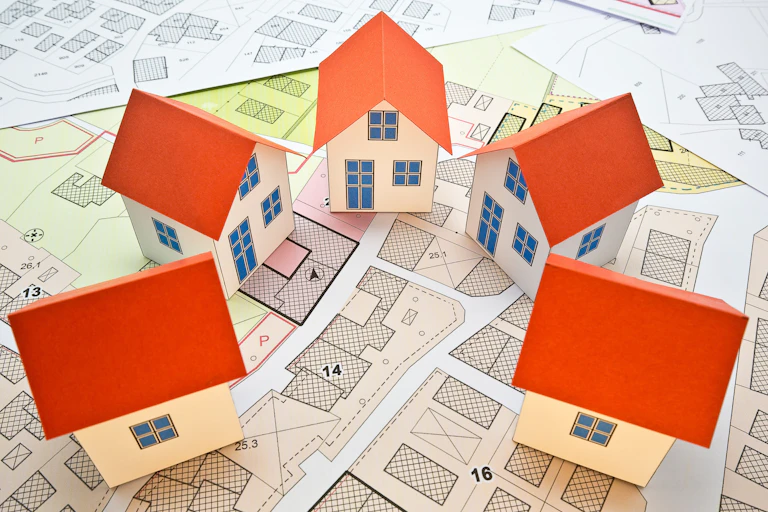 Tiny model houses on a map