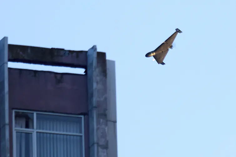 How drones are changing the way wars are fought 1 Aerial view of a drone attacking a building