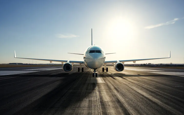 A plane on a runway.