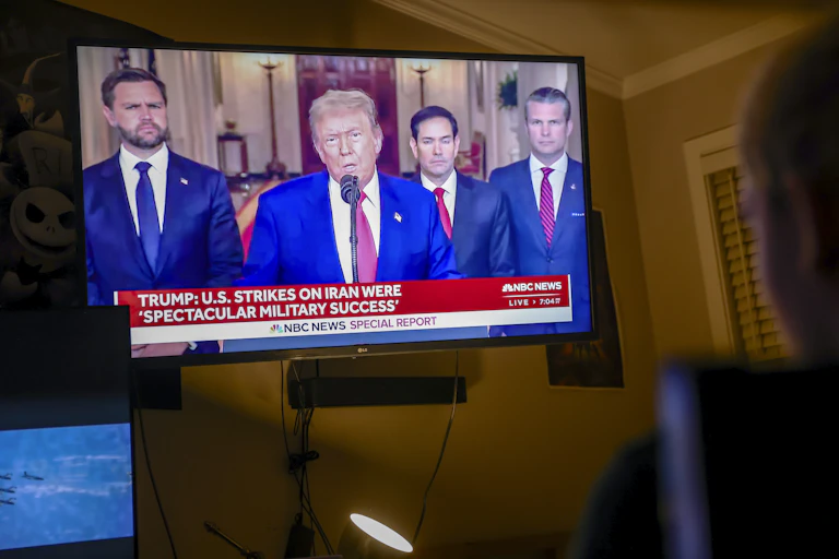 A television showing US president Donald Trump, flanked by vice-president J.D. Vance, secretary of state Marco Rubio and defense secretary Pete Hegseth and M