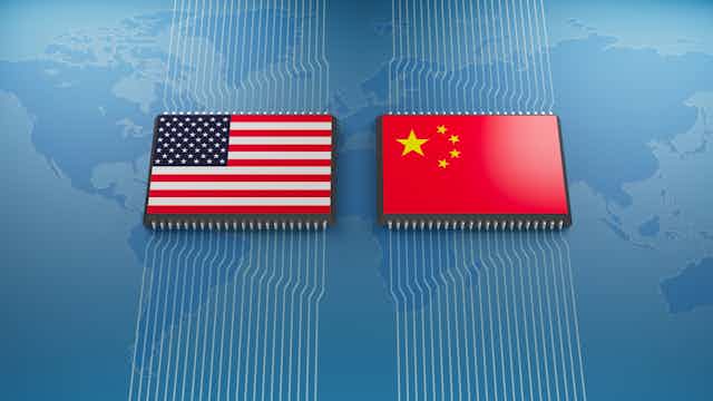 US and Chinese flags on top of computer chips superimposed over a world map