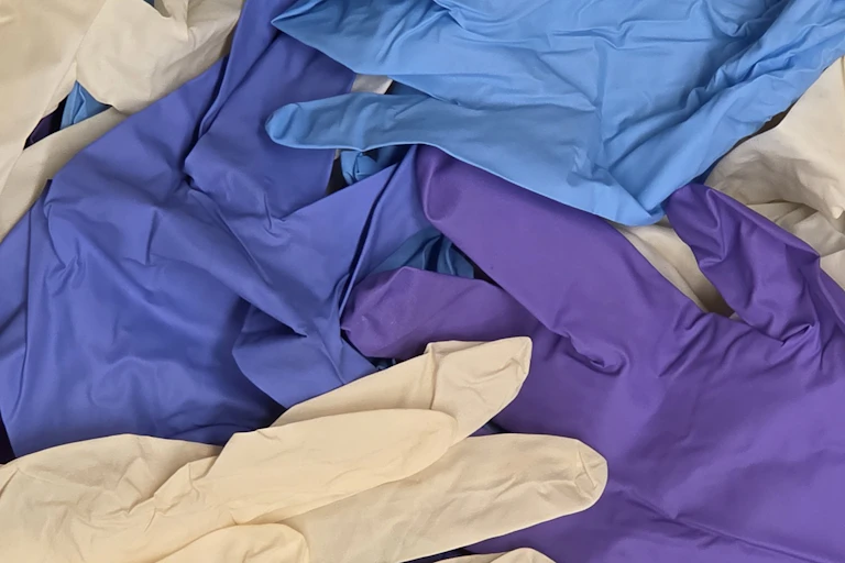 Image of overlapping laboratory gloves.