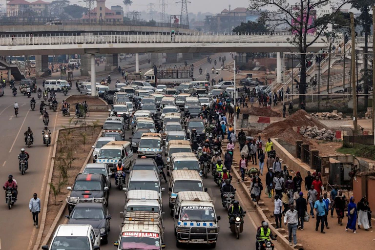 Congested road with vehicles and motorcycles