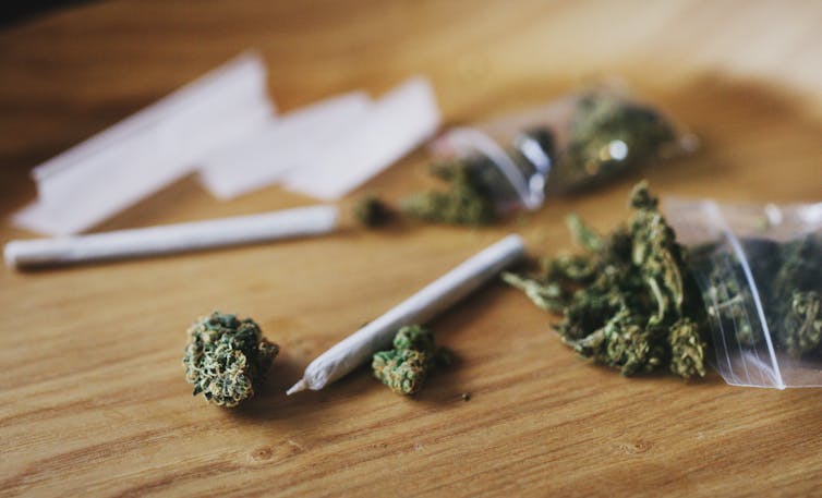 Cannabis and papers on a table