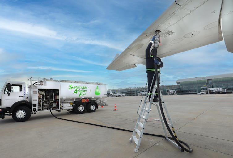 Wing being fulled from sustainable fuel truck.