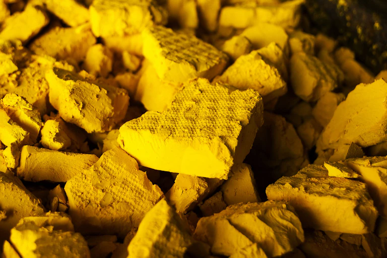 Thick slabs of chalky yellow materials.