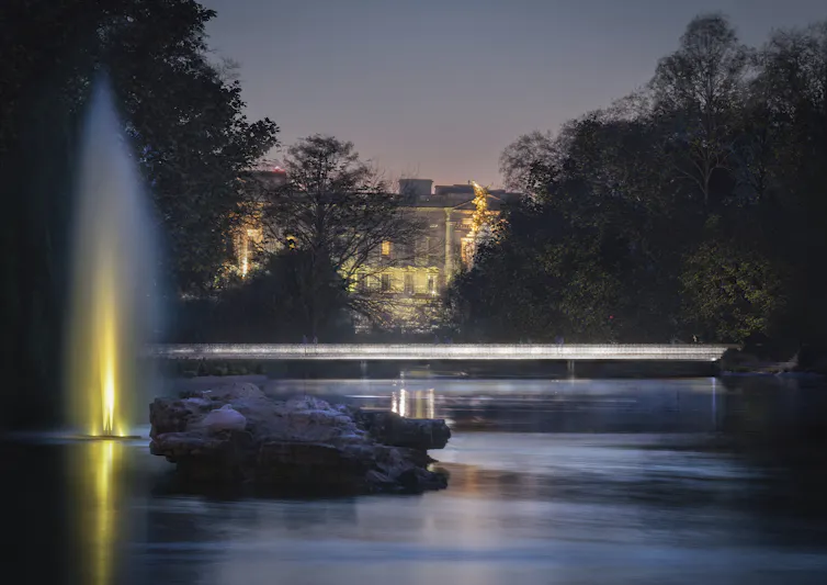 Photo of the lake in St James's park with the palace in the distance