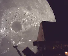 A lunar lander circling the moon