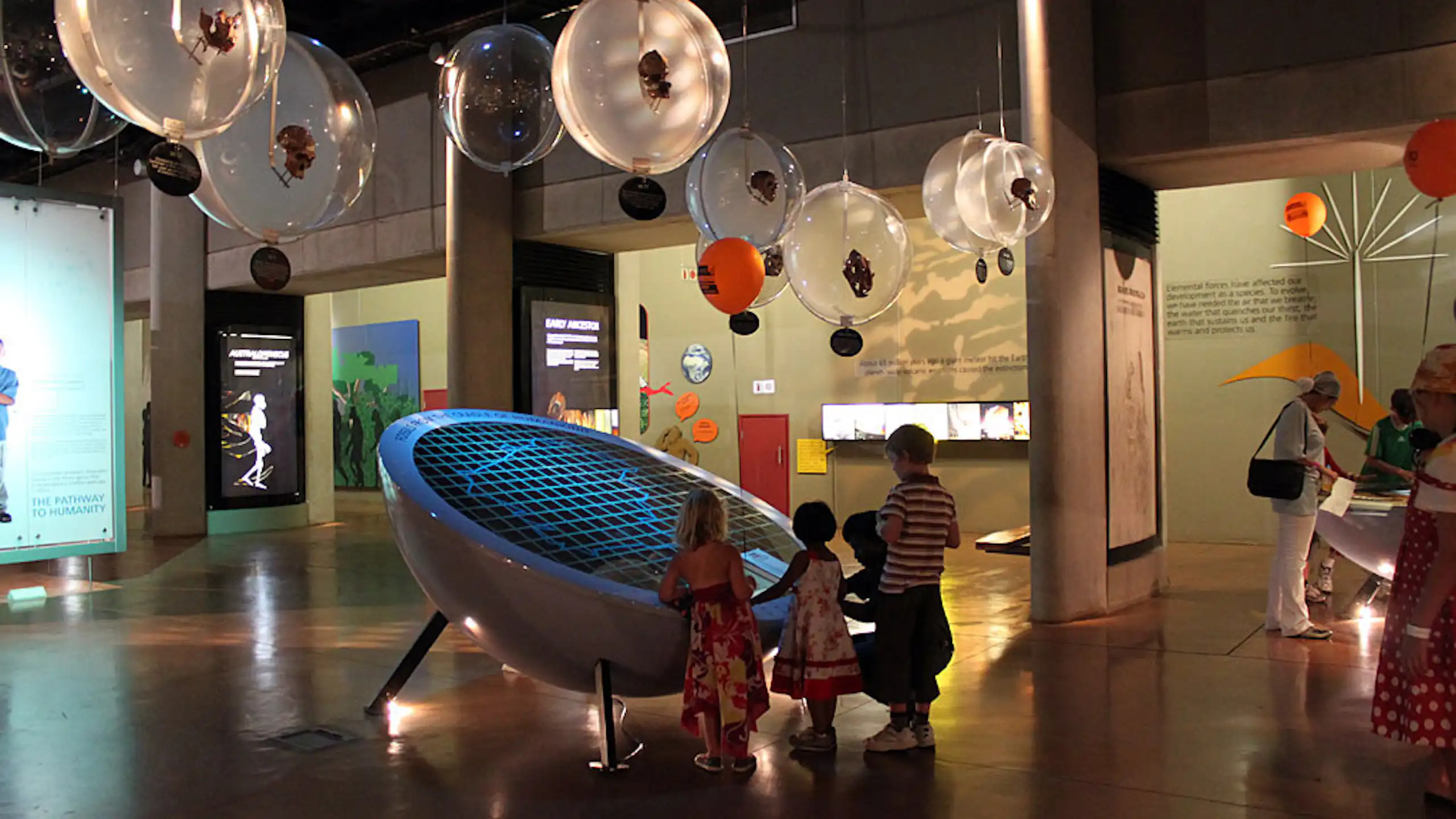 Children in an exhibition space