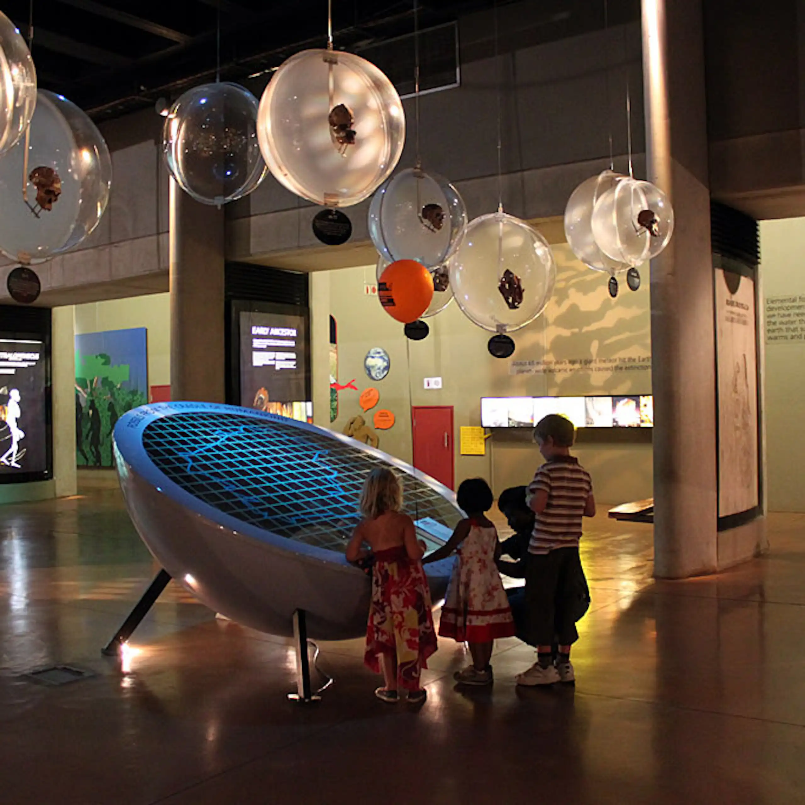 Children in an exhibition space