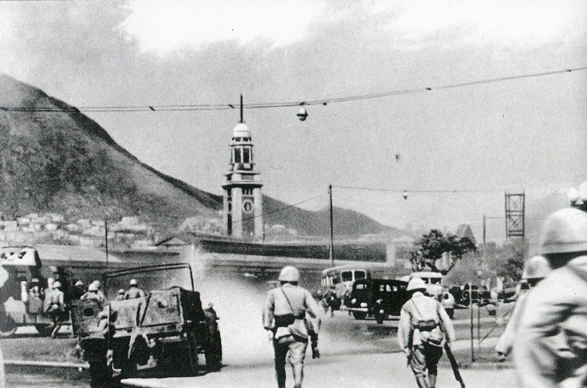 Japanese troops launching an assault on Hong Kong.