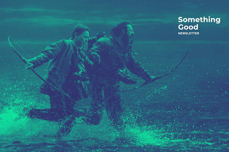 Aaron Taylor Johnson and Alfie Williams running in water.