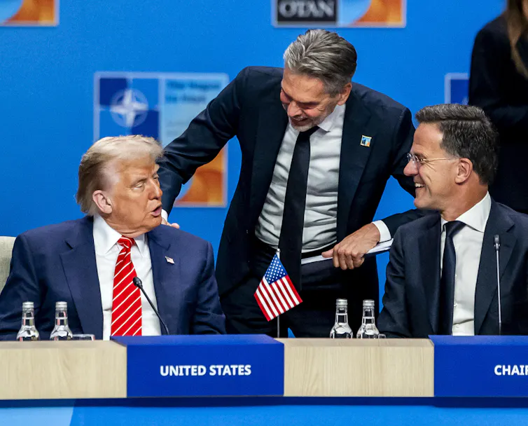 Trump talks with Mark Rutte (right) and the Dutch prime minister, Dick Schoof (centre), at the beginning of the Nato summit in The Hague.